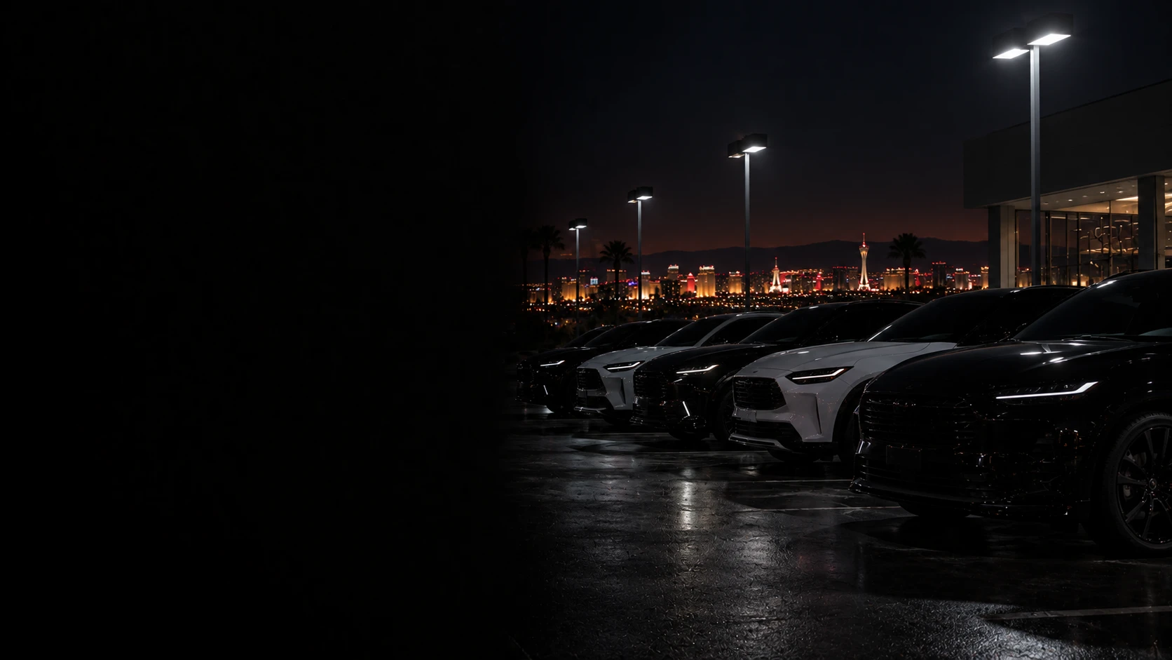 Henderson car dealership lot after closing with the Strip on the horizon